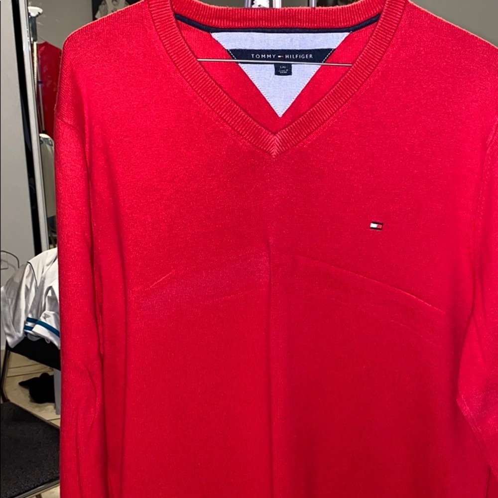 Polo sweater.